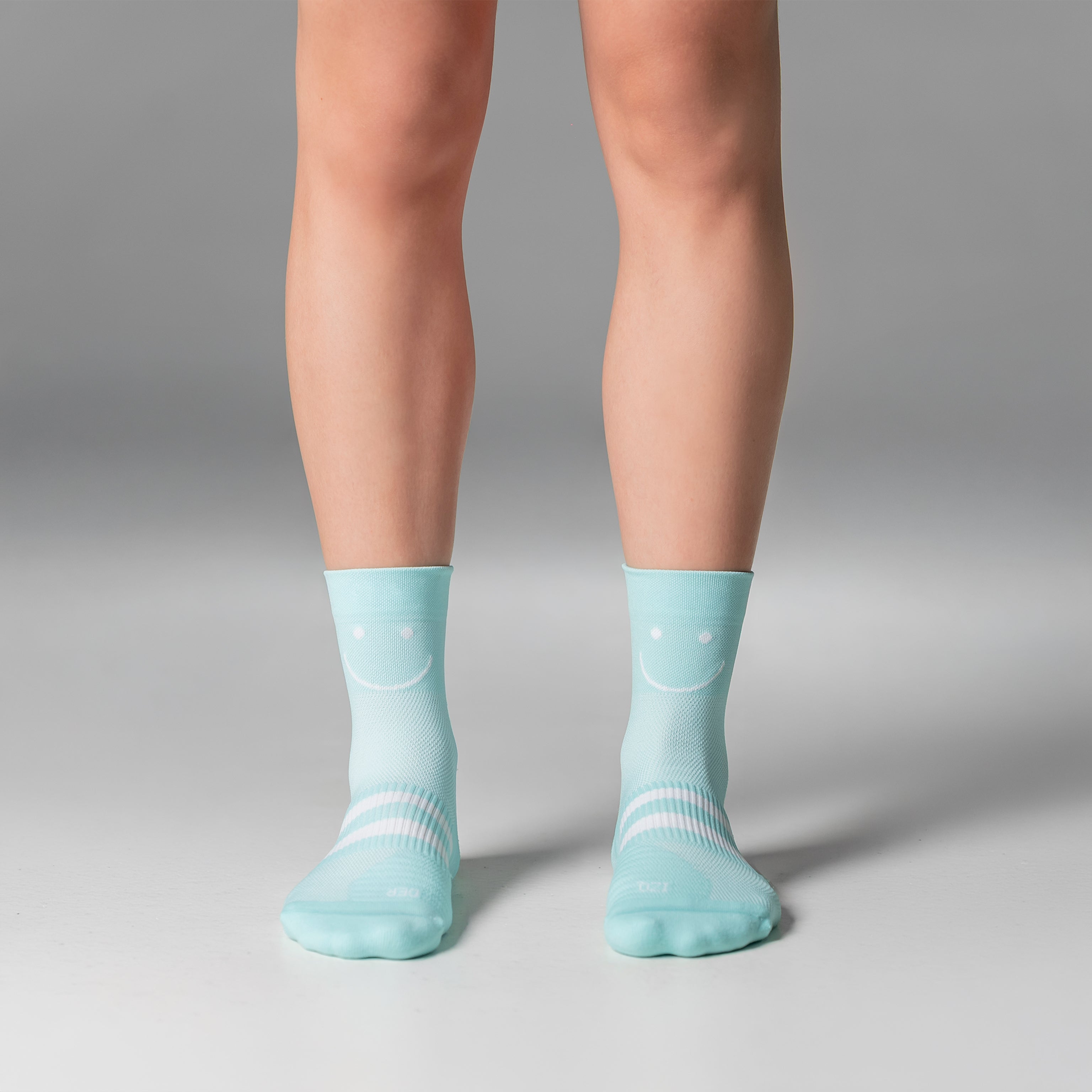 Calcetas deportivas Mini Smiles Pro para running, maratón y ciclismo. Con diseño técnico transpirable, compresión media y soporte en arco plantar, costura antiampollas.
