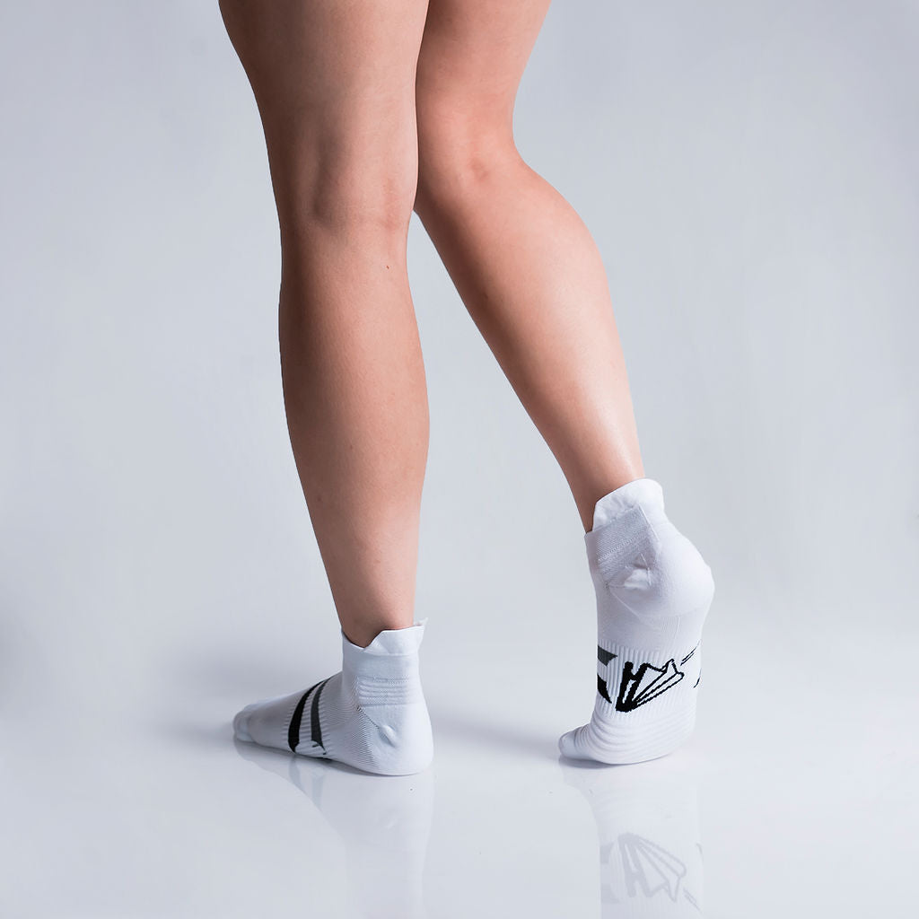 Calcetas deportivas Invisibles para running, maratón y ciclismo. Con diseño técnico transpirable, compresión media y soporte en arco plantar, costura antiampollas.