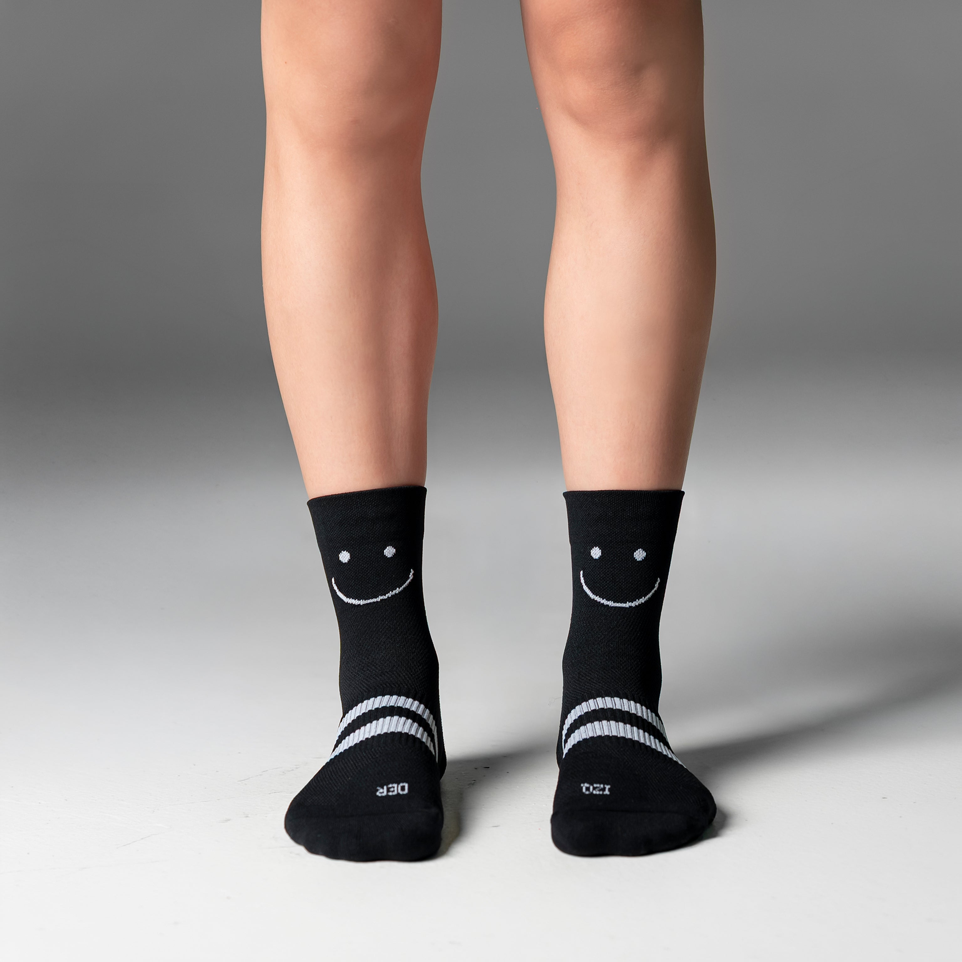Calcetas deportivas Mini Smiles Pro para running, maratón y ciclismo. Con diseño técnico transpirable, compresión media y soporte en arco plantar, costura antiampollas.