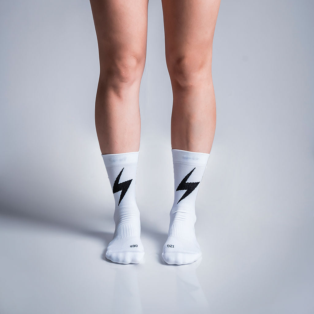 Calcetas deportivas Pro Thunder para running, maratón y ciclismo. Con diseño técnico transpirable, compresión media y soporte en arco plantar, costura antiampollas.